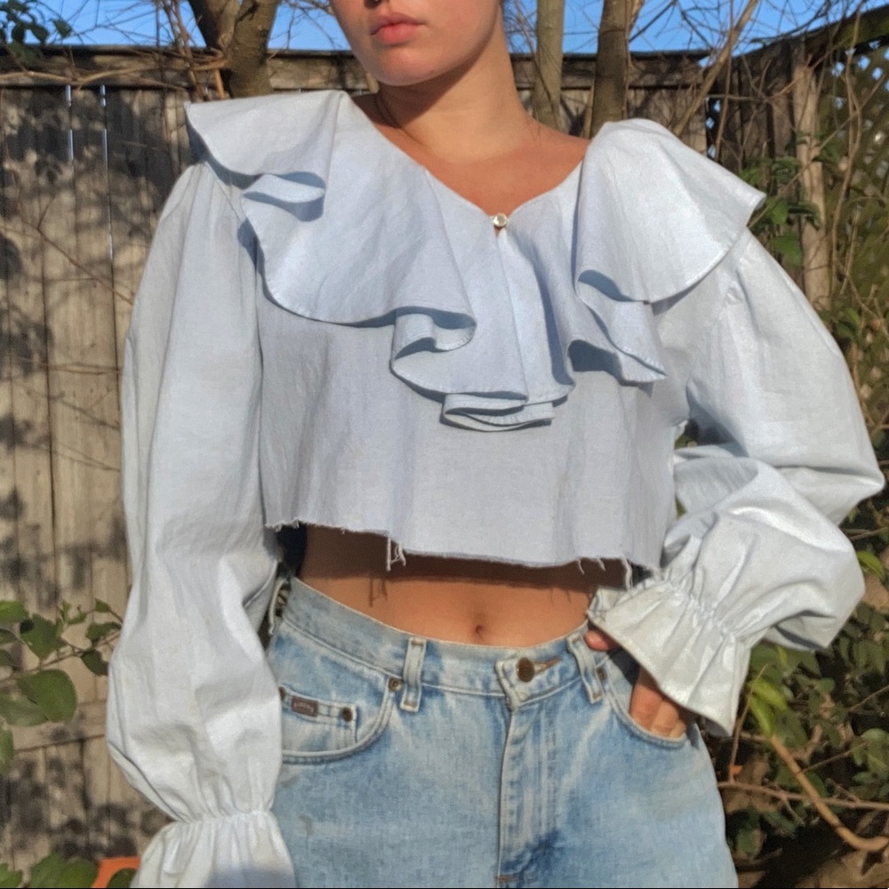 Super vintage, light blue, puffy sleeve blouse.